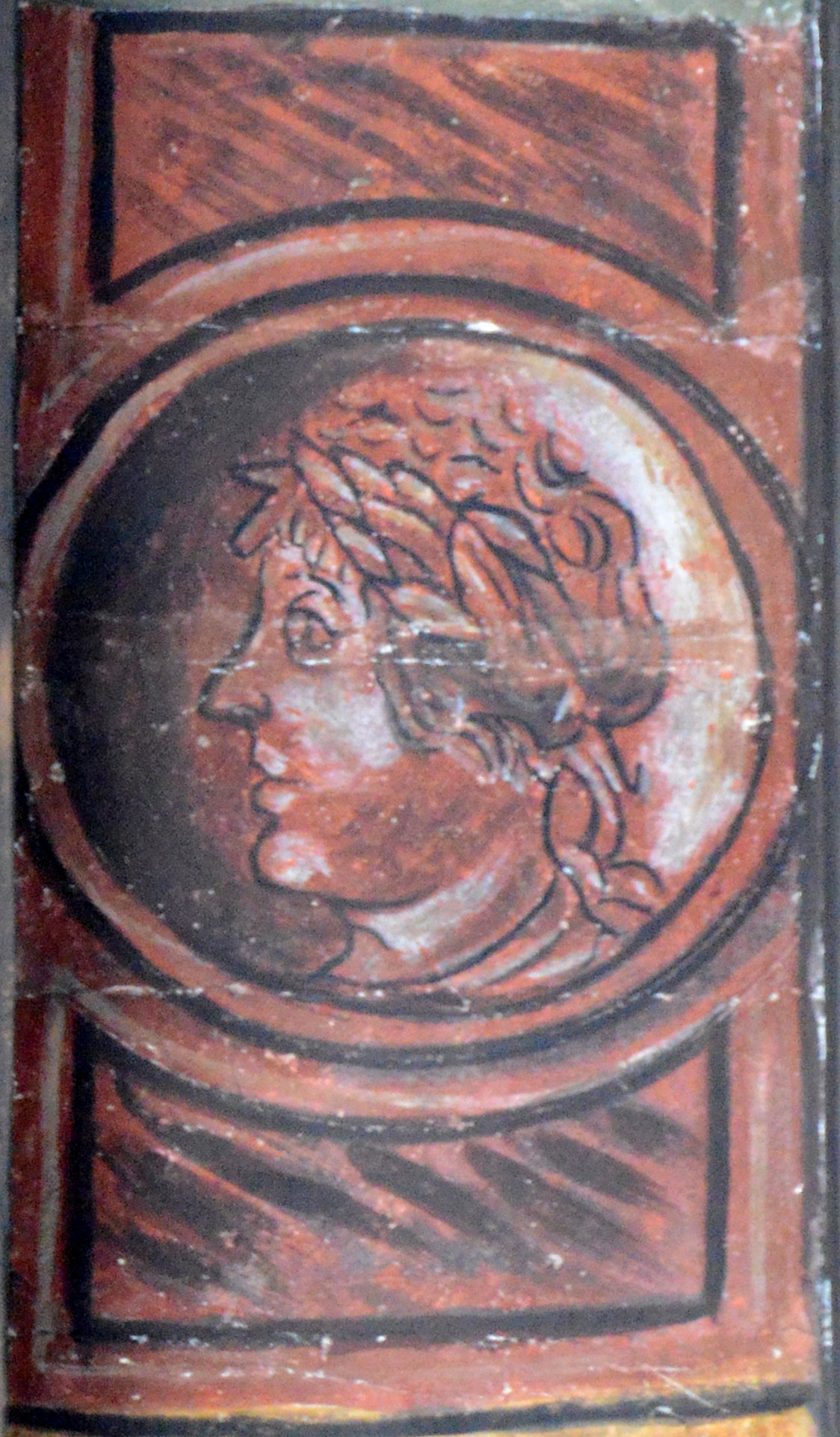 Ritratto di uomo con corona d'alloro