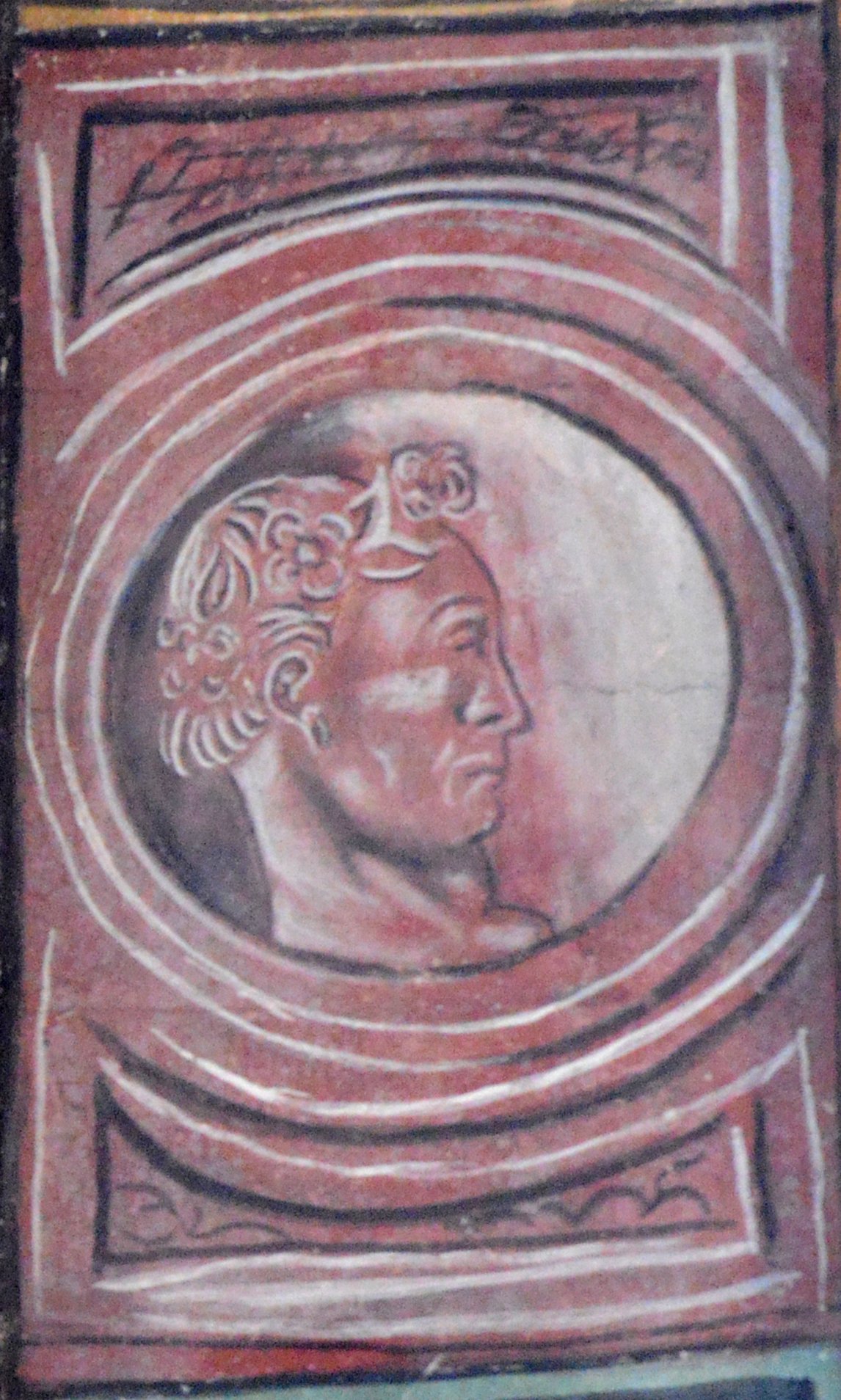 Ritratto di uomo con corona di fiori